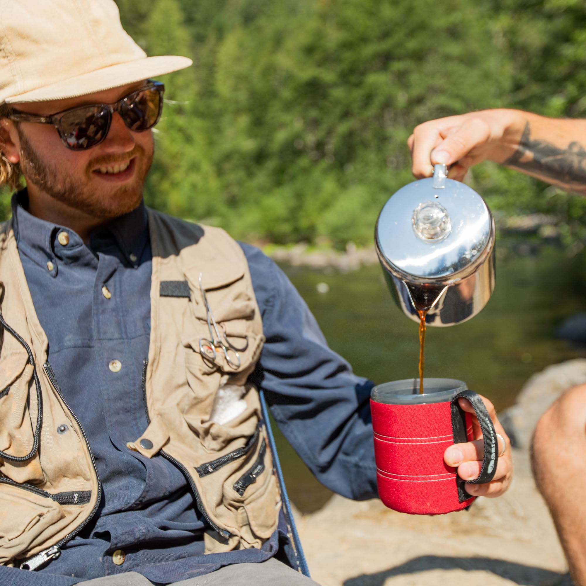 GSI Outdoors Percolator silicone handle aids comfortable pouring during hikes.