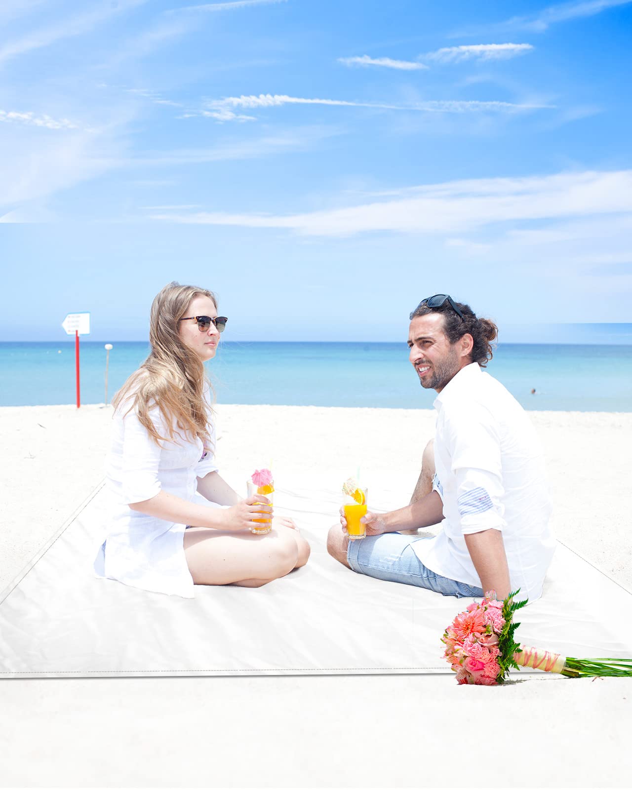 Gsypo Beach Blanket folded into compact carry bag for easy travel