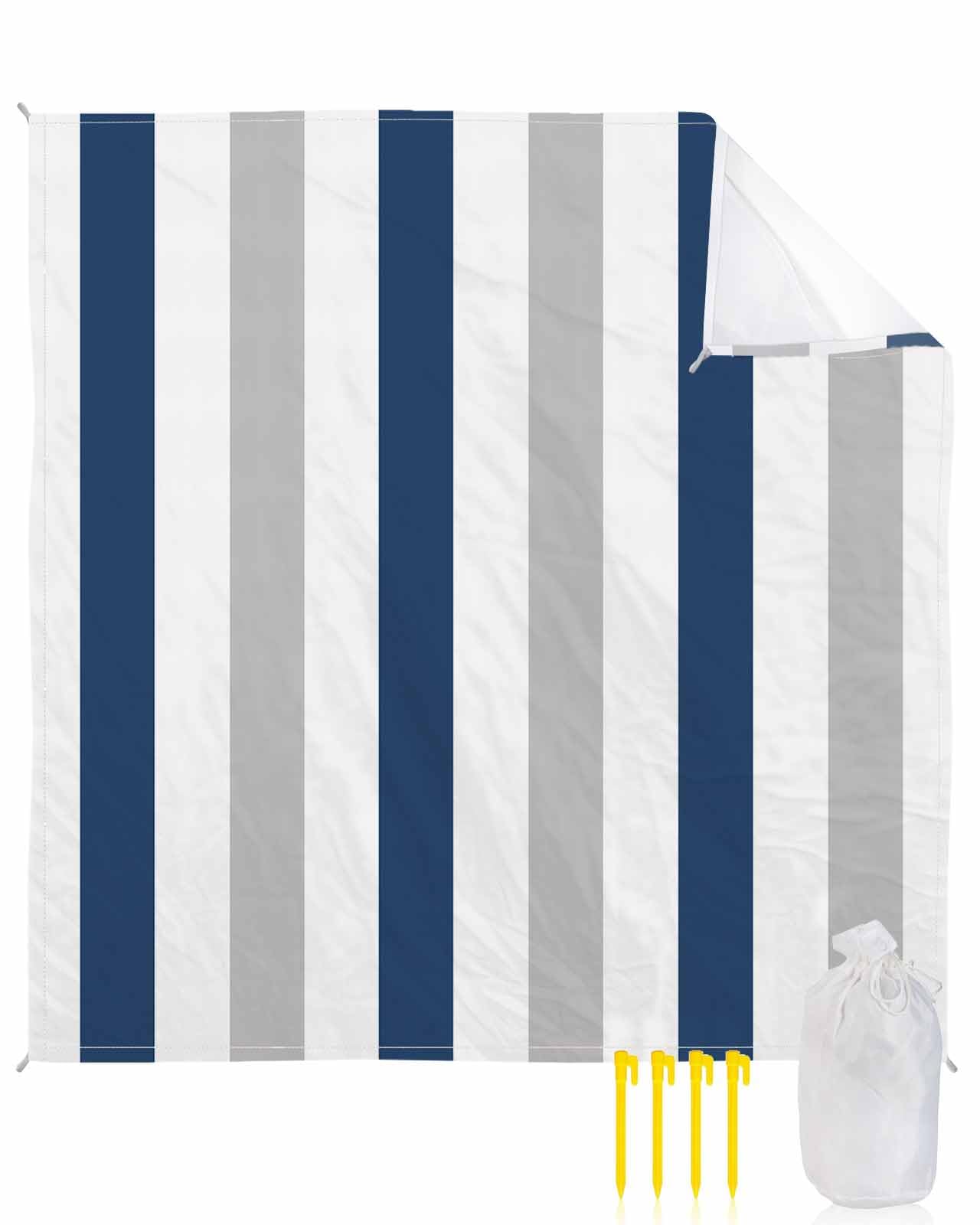 Gsypo Beach Blanket waterproof with quick-dry surface for easy cleanup at the shore.