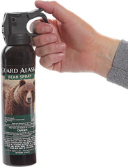 Guard Alaska bear spray with nylon holster shown for easy carry.