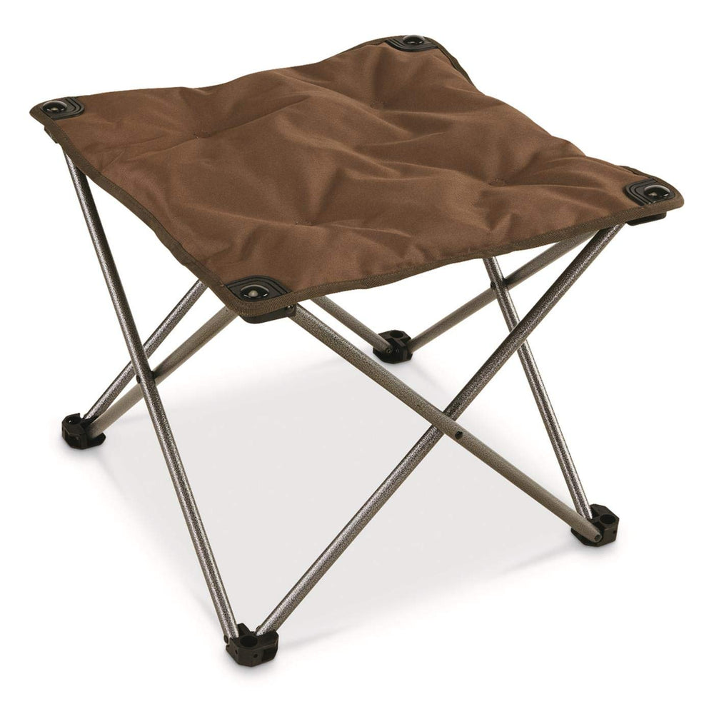 Guide Gear camping chair foot stool in brown, folding for easy outdoor relaxation