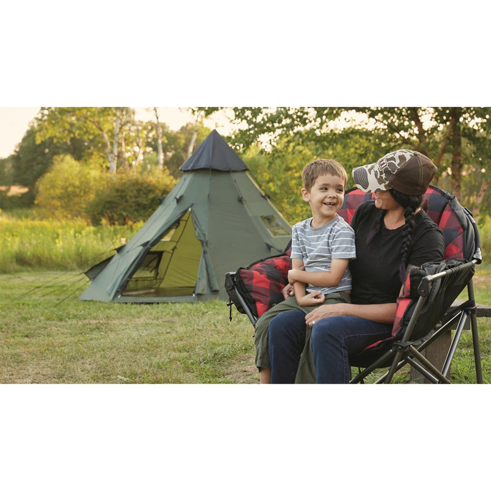 Guide Gear Club camping chair ready by the fire for seating.