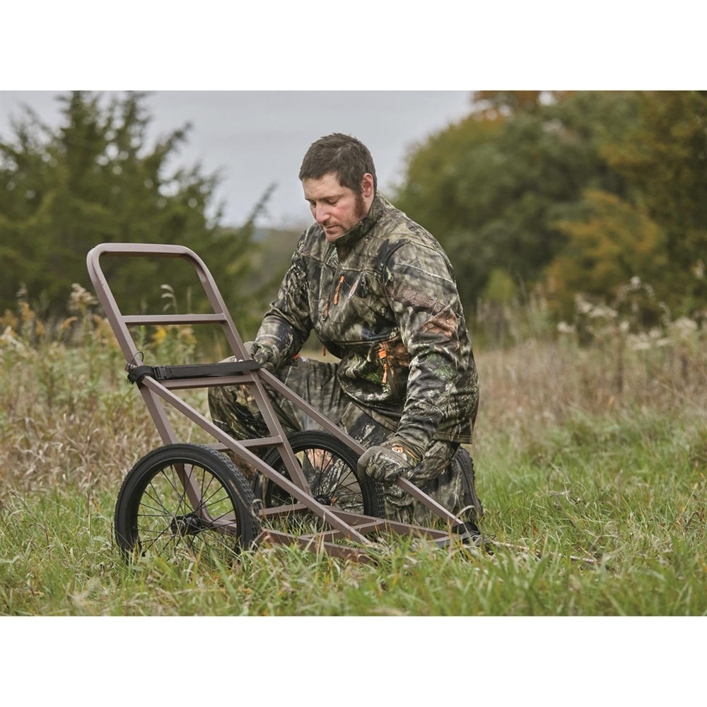 Guide Gear Deluxe Deer Cart with 16-inch wheels glides over rough terrain.