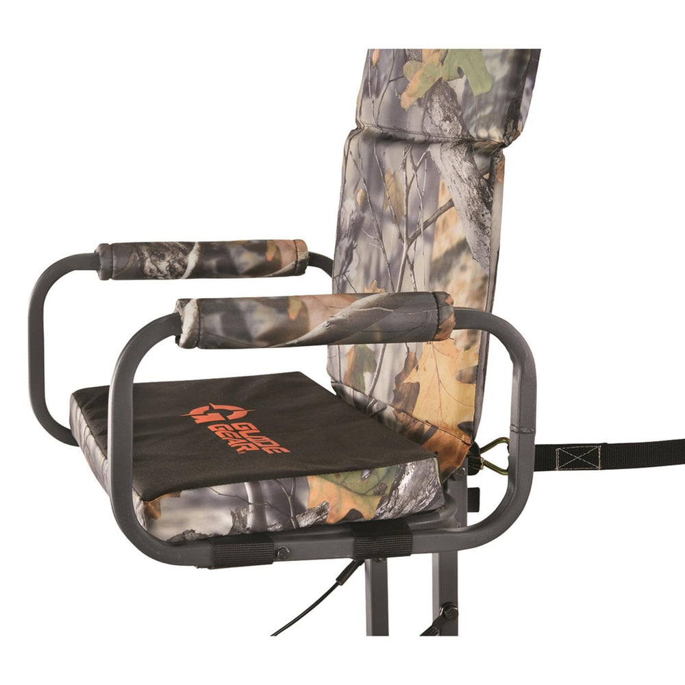 Guide Gear Deluxe Hang-On tree stand with folding footrest for relaxed positioning.