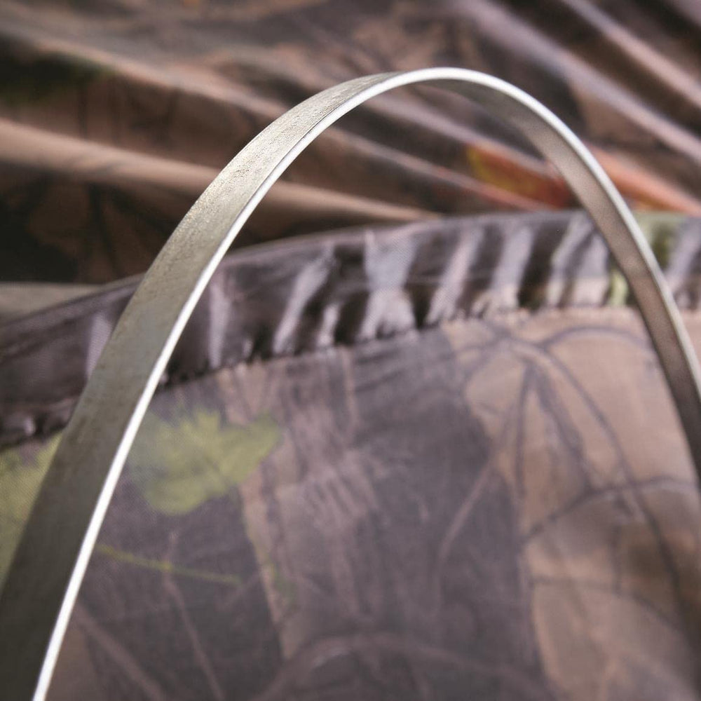 Guide Gear HuntRite Deluxe weather-ready shell suggests durable concealment in diverse conditions.