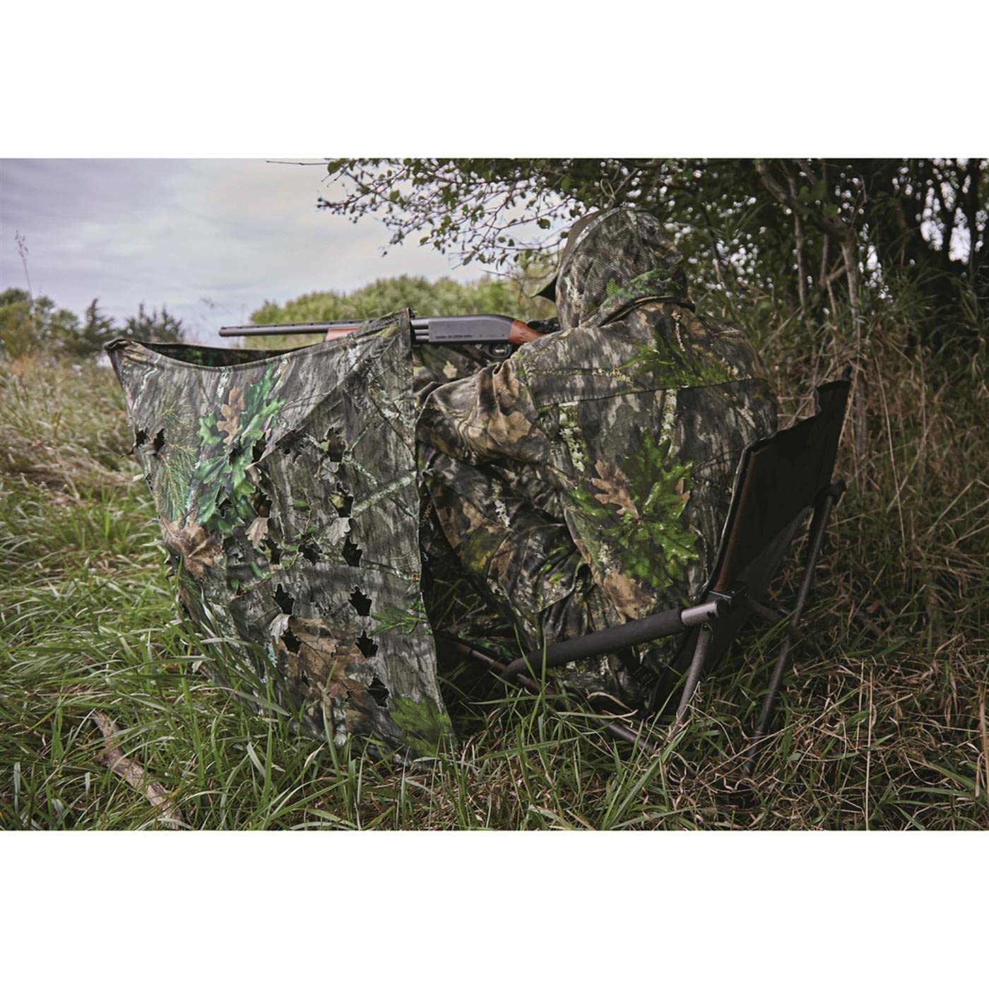 Guide Gear Magnum Turkey Chair camo Mossy Oak Obsession helps concealment in natural settings.