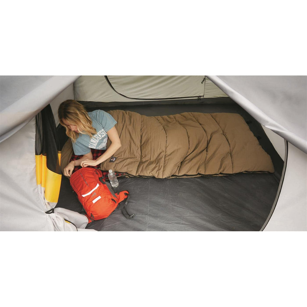 Guide Gear sleeping bag durable canvas shell withstands rugged outdoor use.
