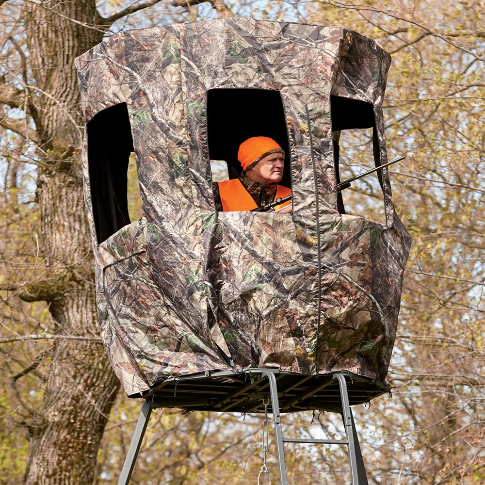 Guide Gear steel construction enclosure on a tripod stand providing sturdy shelter