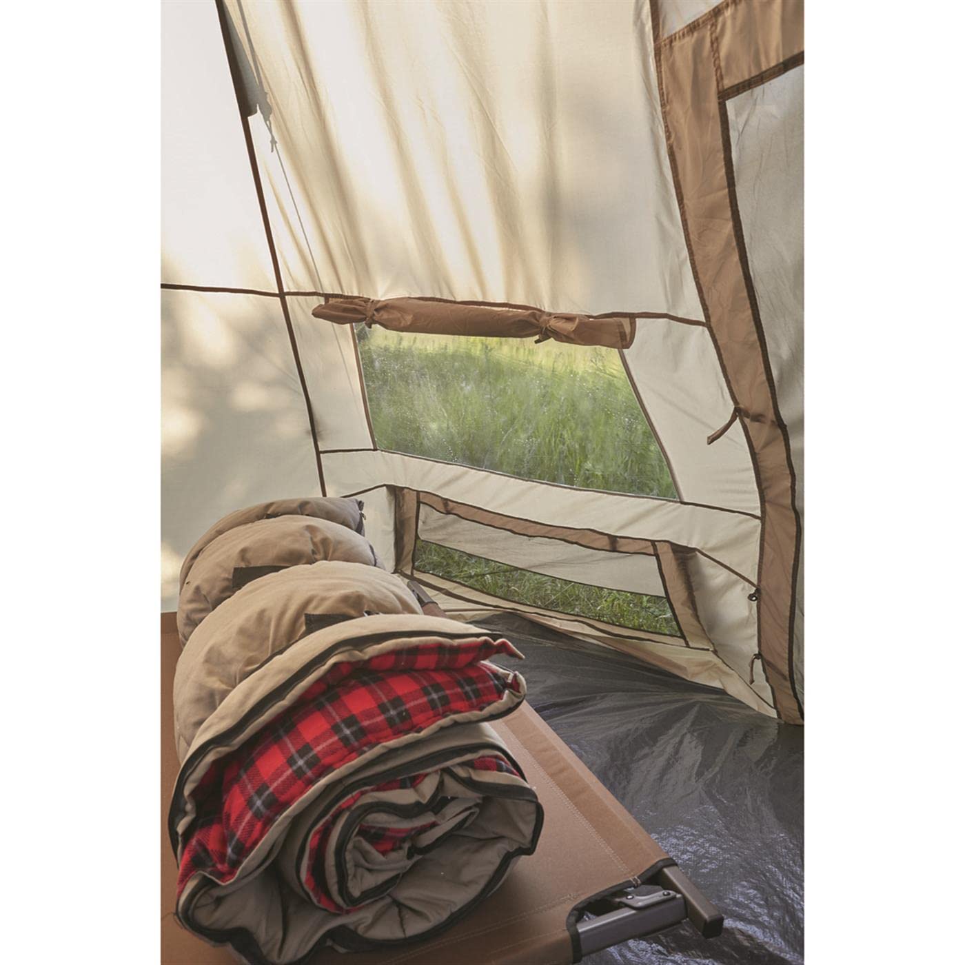 Guide Gear teepee tent sewn-in floor protects against moisture on damp ground.