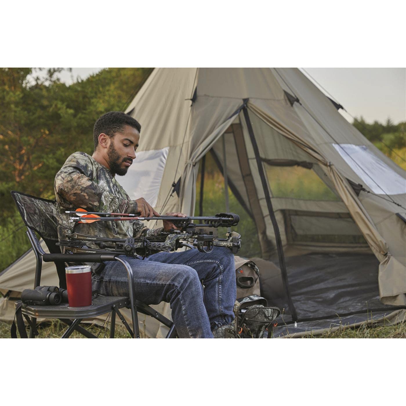 Guide Gear teepee tent wide doors for easy loading bulky gear.