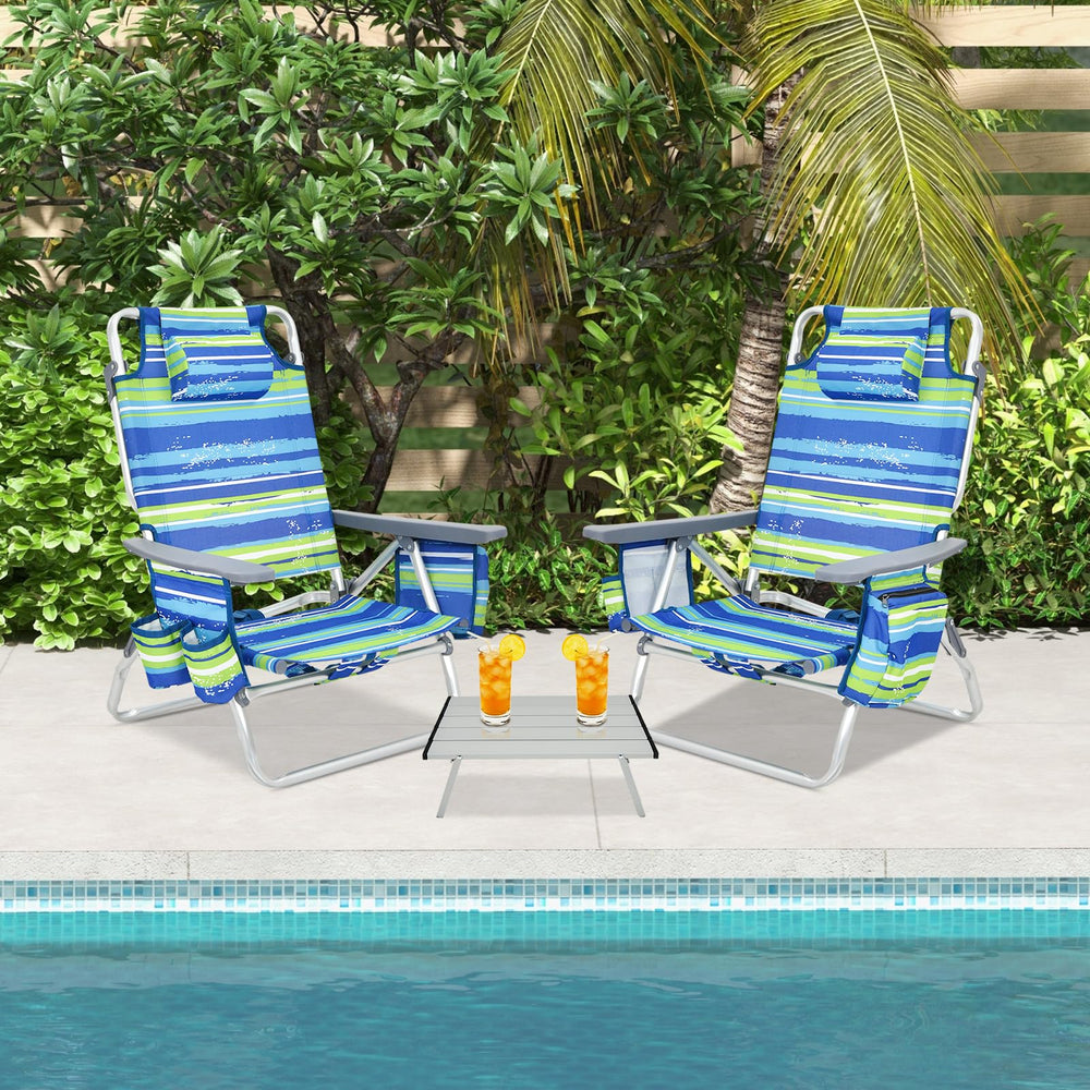 GYMAX beach chair in use at the beach for comfy seating.