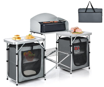 GYMAX folding camping table with aluminum top, ideal for outdoor cooking.