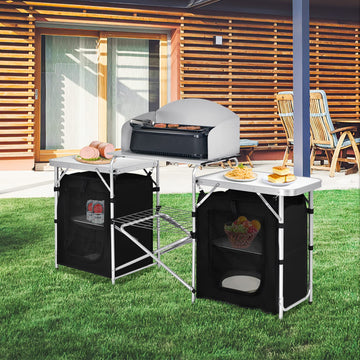 GYMAX foldable camping table in use, quick setup for meals on the go.