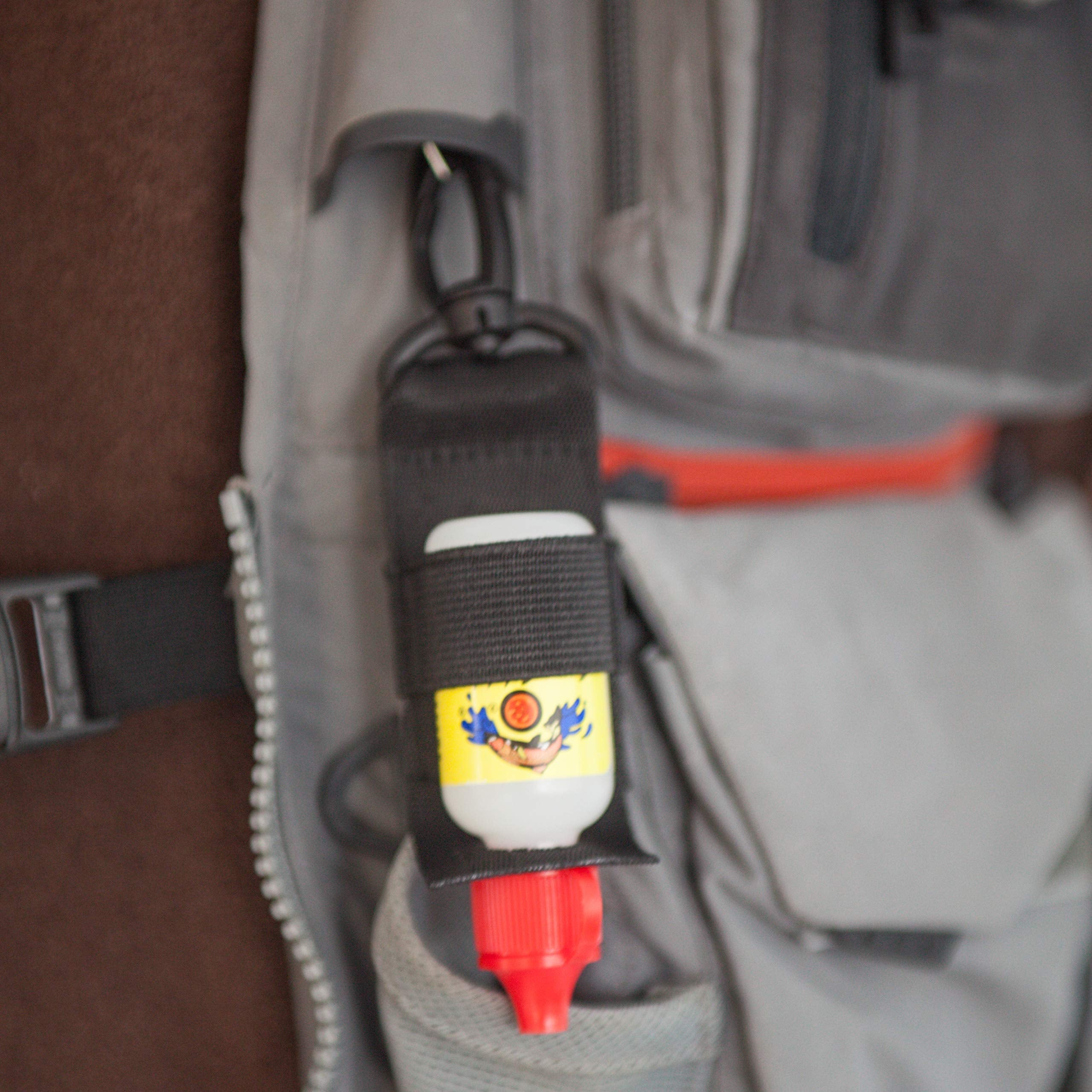 H2O FLIES WNDHYA attachment system keeps gear secure on vest or pack.