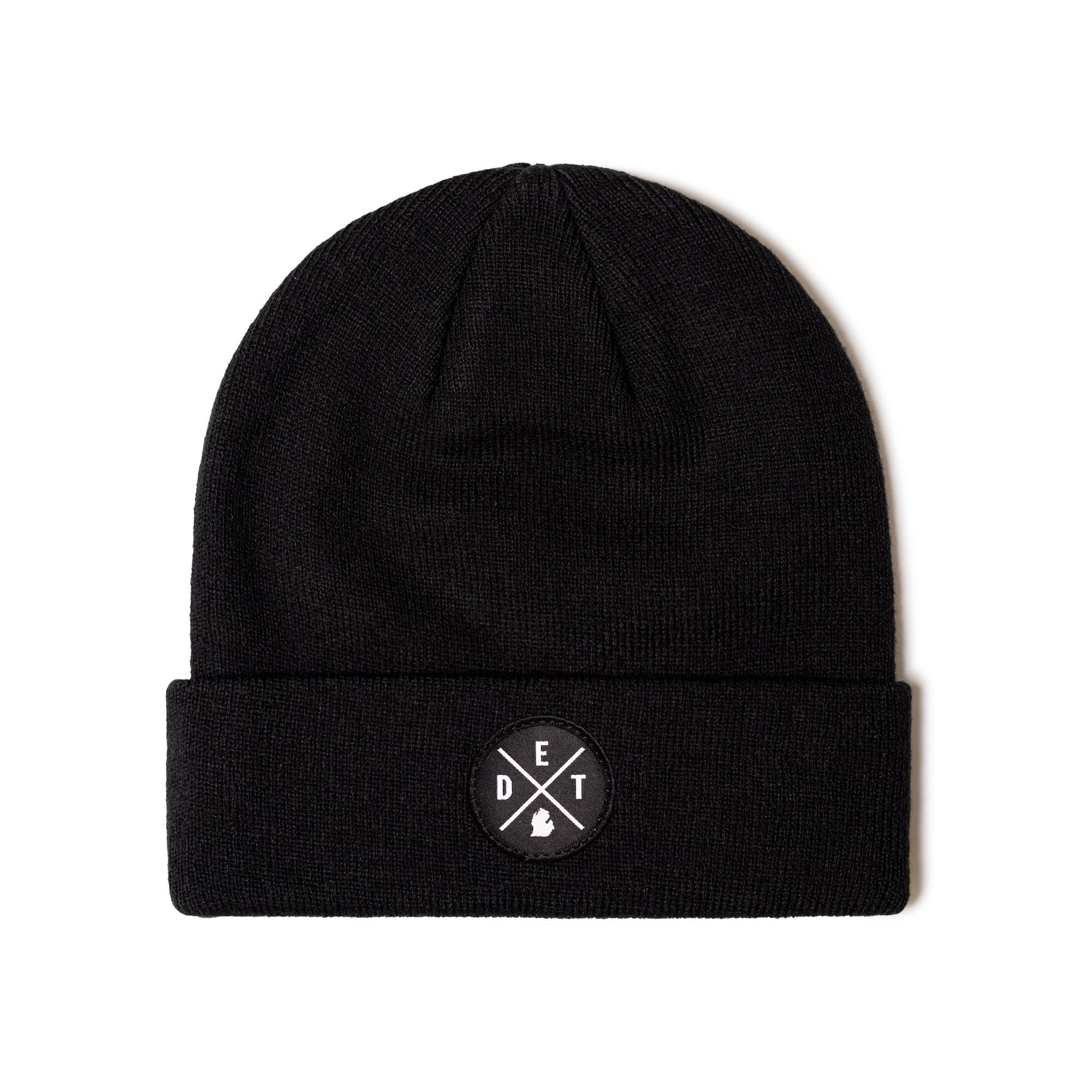 HAKA DET Premium Beanie Black patch detail for durable outdoor wear.