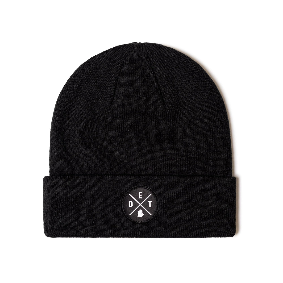 HAKA DET Premium Beanie Black patch detail for durable outdoor wear.