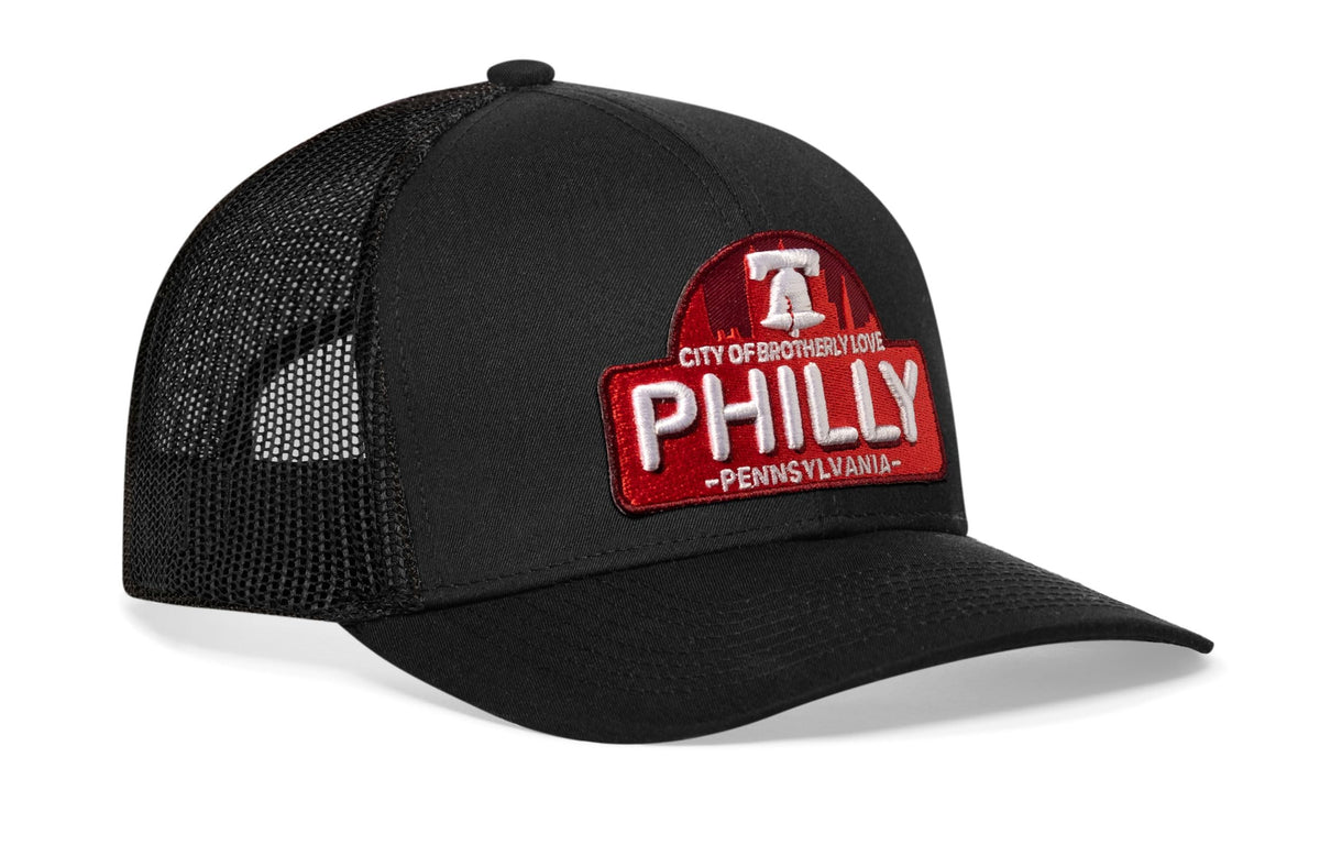 HAKA Philadelphia Black Trucker Hat with puff patch for city style and durability.