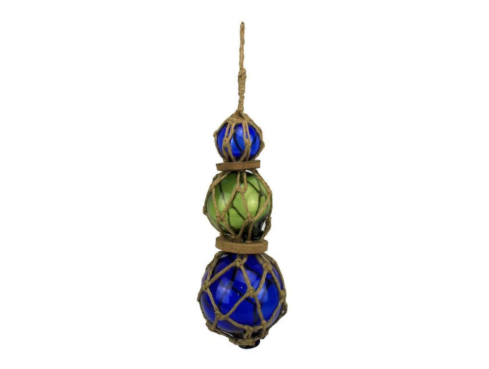 Nautical wall art with blue green blue glass floats and brown rope netting