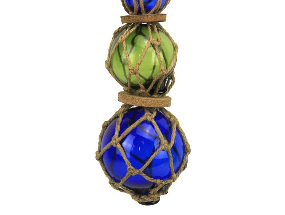 Blue green blue glass buoy with vintage fishing netting decor