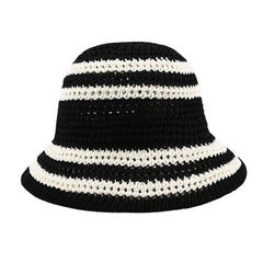 Front view of handmade black crochet straw sun hat with colorblocked striped pattern