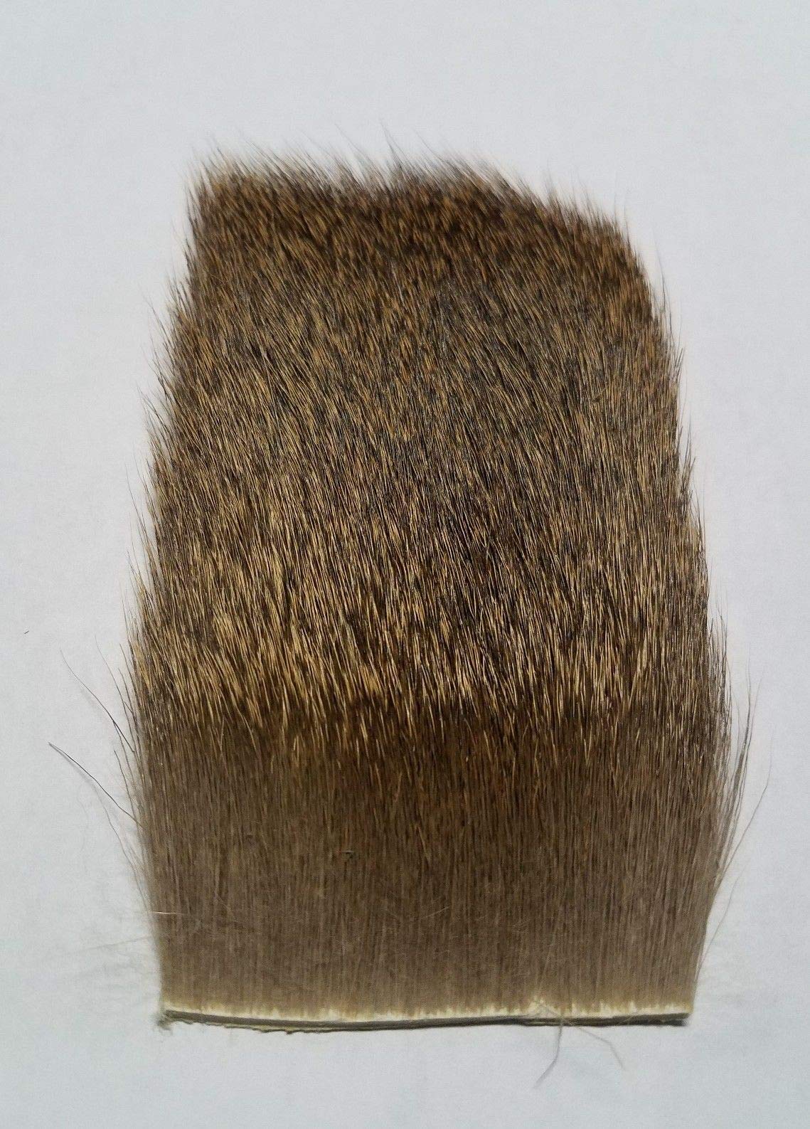 Hareline Coastal Deer Hair Dark close-up highlighting buoyant fibers for natural movement