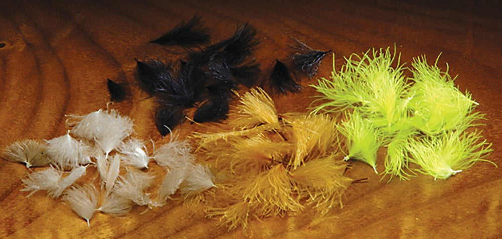 Hareline Cul De Canard Oiler Puffs Tan provides buoyant, oil-saturated CDC feathers for emerger flies