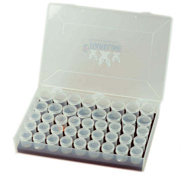 Hareline Dubbin Aeiniwer stash box open compartments ideal for tying materials.