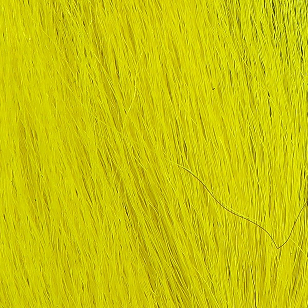Hareline Dubbin bucktail yellow close-up for vibrant streamer ties