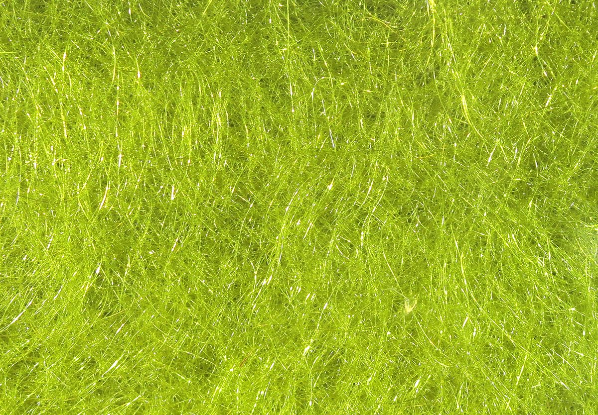 Hareline Dubbin Scud Dub Olive close-up shows translucent fibers for realistic nymphs.