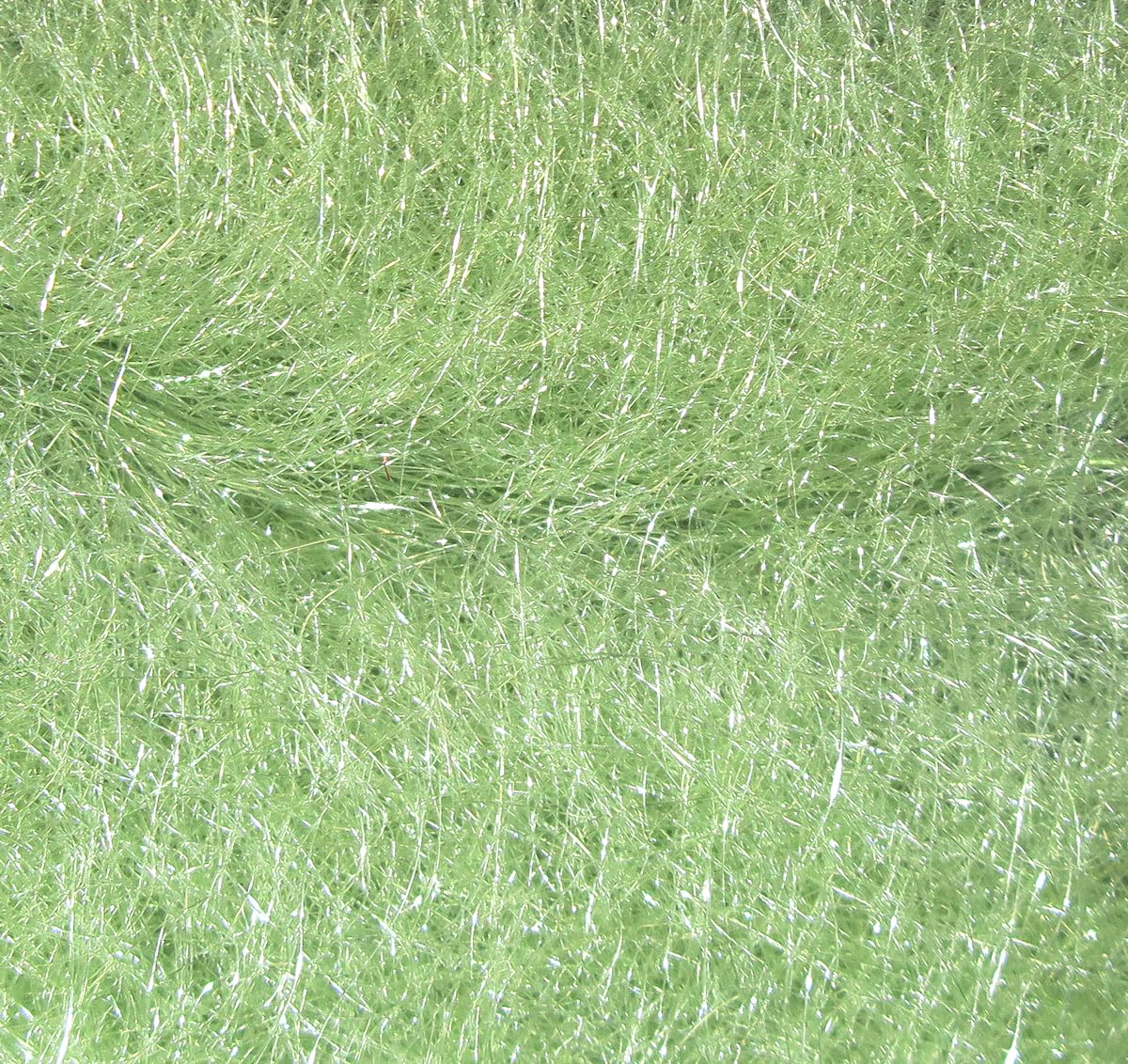 Hareline Dubbin scud dub pale olive close-up showing bright fibers for realistic nymphs