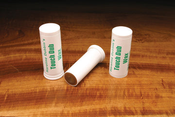 Hareline Dubbin Touch Dubbing Wax in large-tube packaging, ready for easy, secure dubbing in fly tying