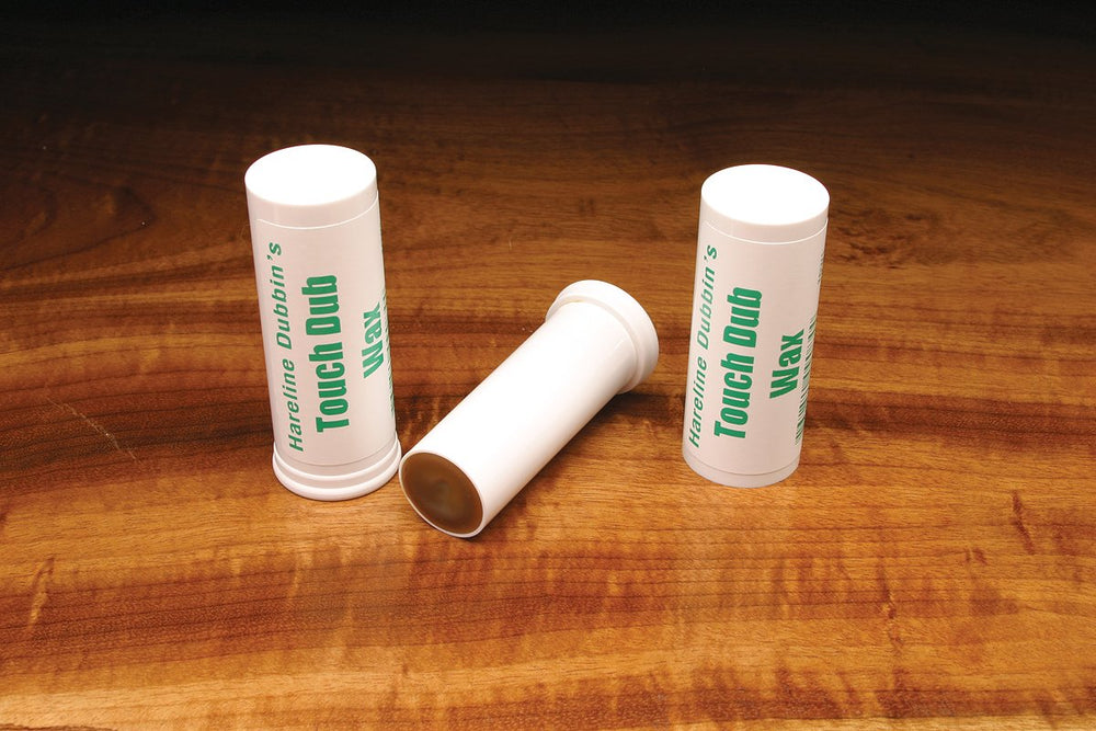 Hareline Dubbin Touch Dubbing Wax in large-tube packaging, ready for easy, secure dubbing in fly tying