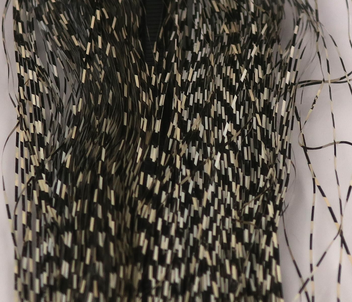 Hareline Dubbin Voodoo Fibers micro-barred black tan closeup highlighting lifelike flash