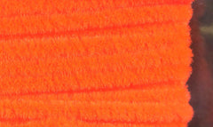 Hareline Dubbing Chenille in Florescent Orange adds bright texture to small fly patterns.