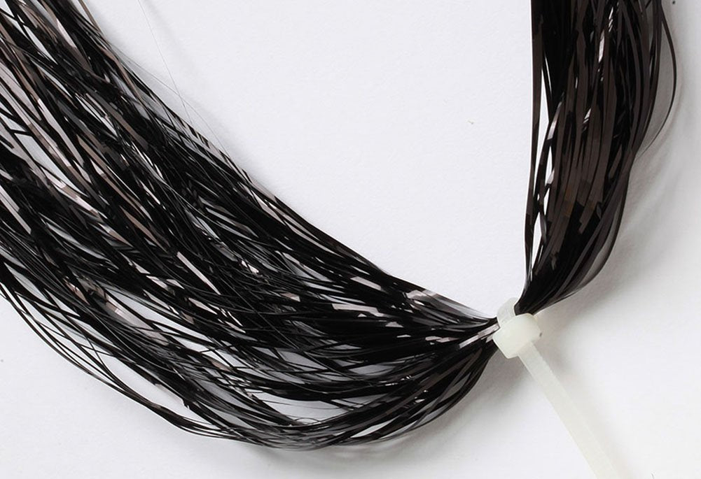 Hareline Flashabou Magnum Black strands shimmer for bold fly tying accents.