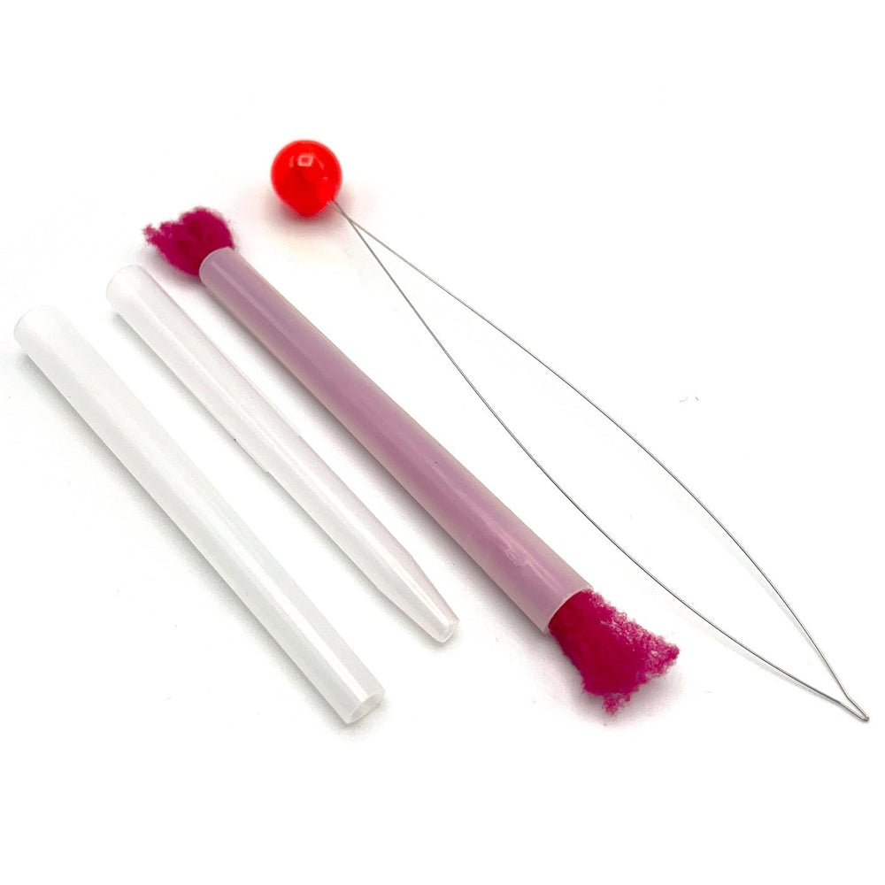 Hareline Glo Bug Dispenser close-up for quick, consistent egg fly tying.