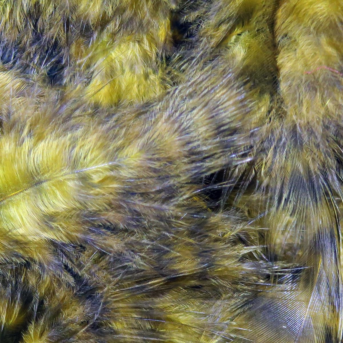 Hareline Grizzly Marabou Sculpin Olive fibers deliver high-contrast movement for streamers