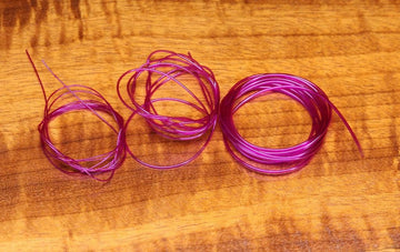 Hareline Hollow Tubing Micro Orange on spool, ready for quick, consistent tie-ins