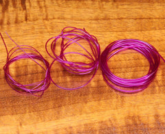 Hareline Hollow Tubing Standard Black closeup, ideal for precise body shaping in flies.