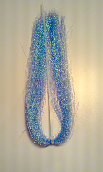 Hareline Krystal Flash Smolt Blue bottle shows vibrant color for flies.