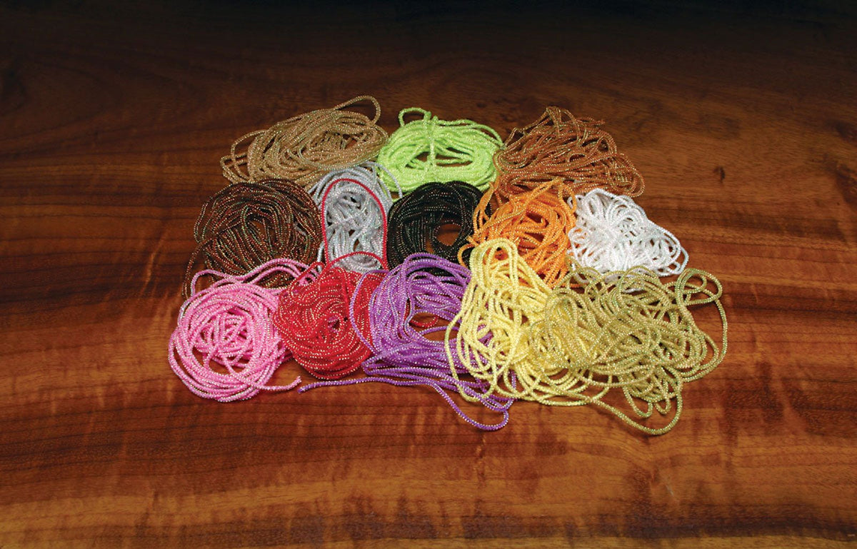 Hareline Micro Pearl Core Braid Root Beer showing dual color depth for small patterns.