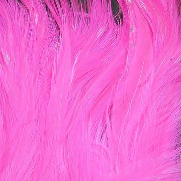 Hareline Saltwater Neck Hackle Hot Pink 188 close-up shows vibrant color and stiff quills for durable flies