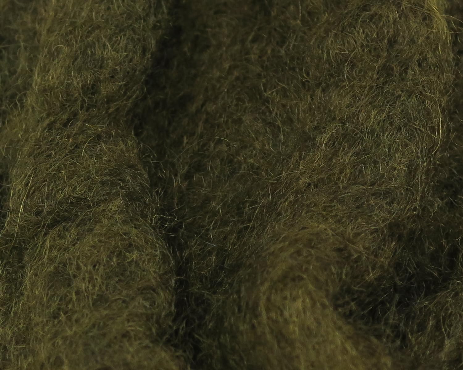 Hareline Sculpin Wool Dark Olive dubbing closeup showing rich texture for realistic heads.