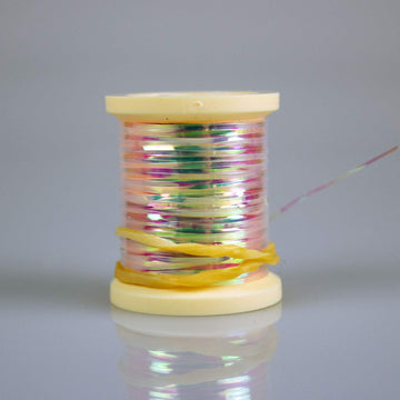 Hareline pearlescent flat tinsel in medium spool for shimmering fly tying accents