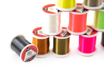 Flat thread minimizes build-up near the hook eye for small fly patterns.