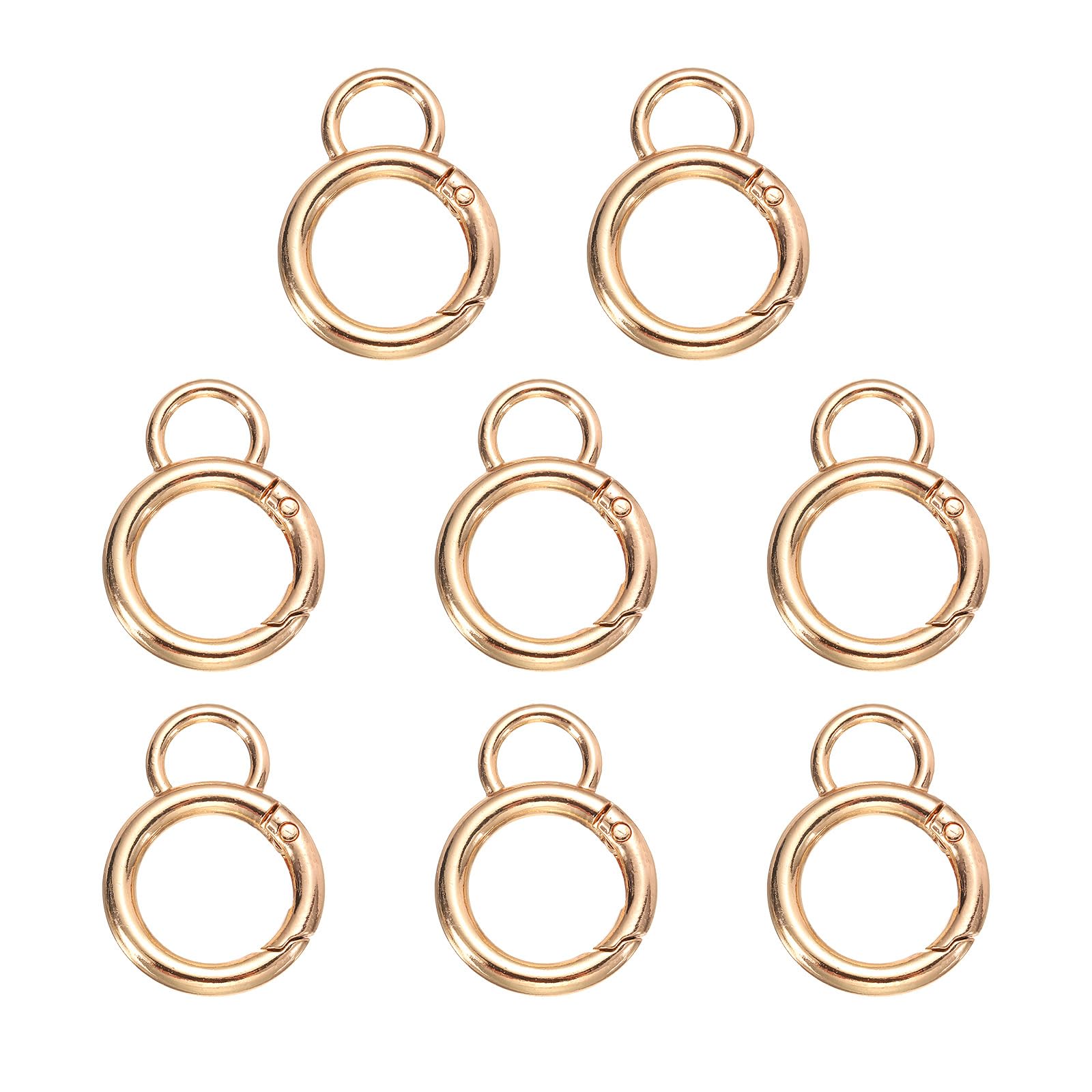 Harfington spring O-ring clip close-up in gold, easy one-handed key attachment.