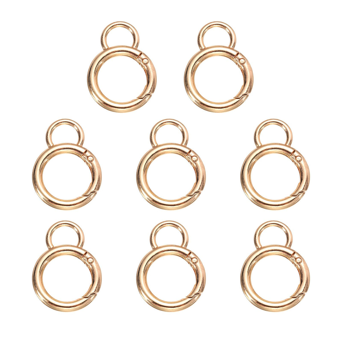 HARFINGTON gold spring O-ring clip on a keyring for secure everyday use.