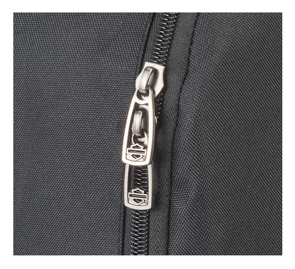Side view shows capacity for daily gear and essentials.