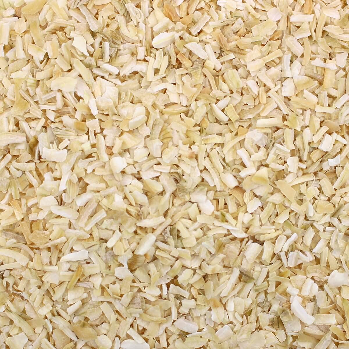 Sizzling pan with Harmony House dried onions chopped for quick sauté.