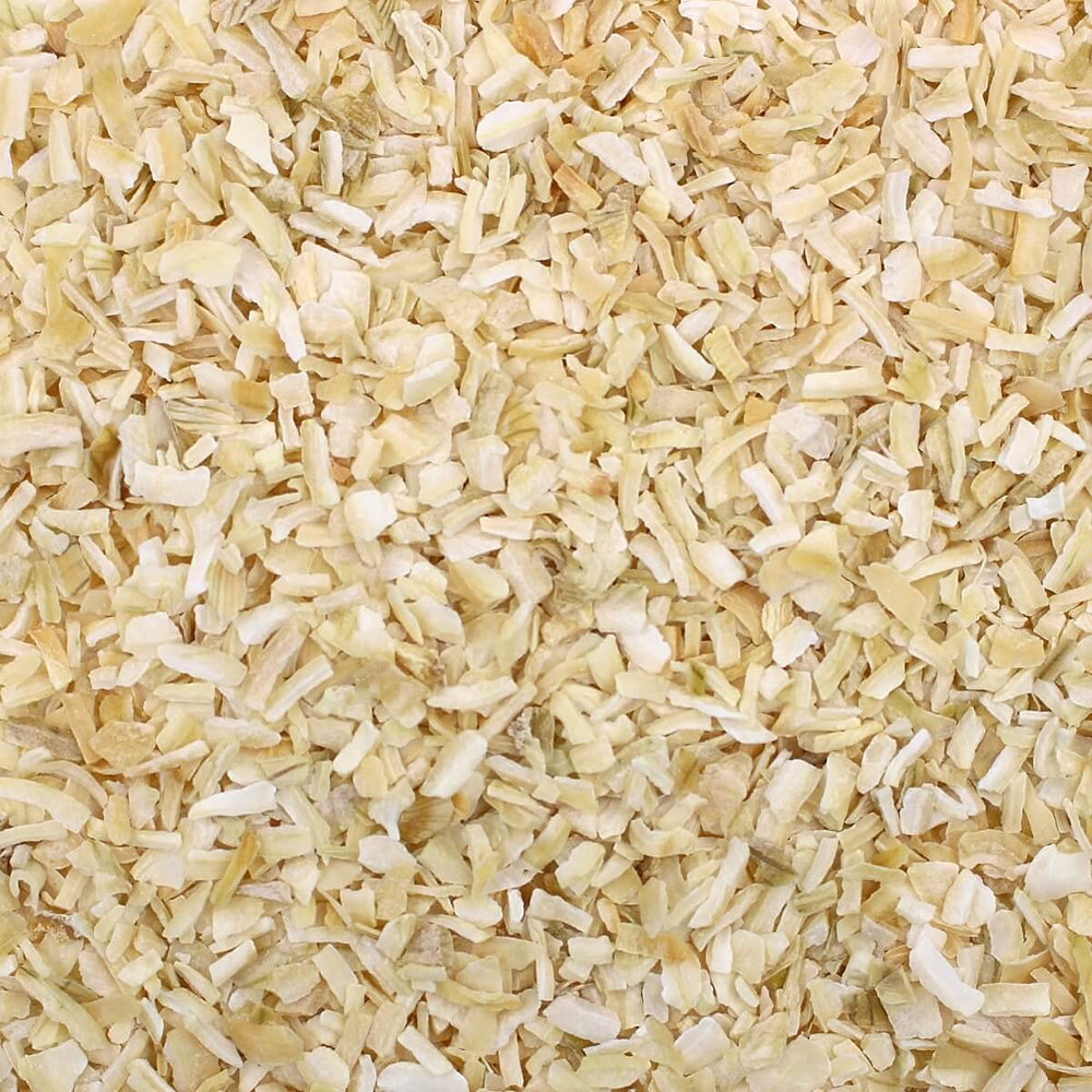 Sizzling pan with Harmony House dried onions chopped for quick sauté.